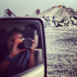 Genia taking photographs at one of the Diamond Mines she gained access to. Image courtesy Genia Boustany